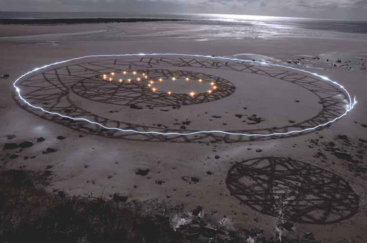 The moon, the lanterns and the sand drawing.