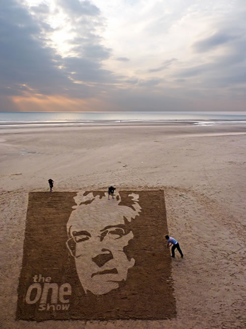 Can you do a sand drawing tomorrow of Randy Newman for the One Show?