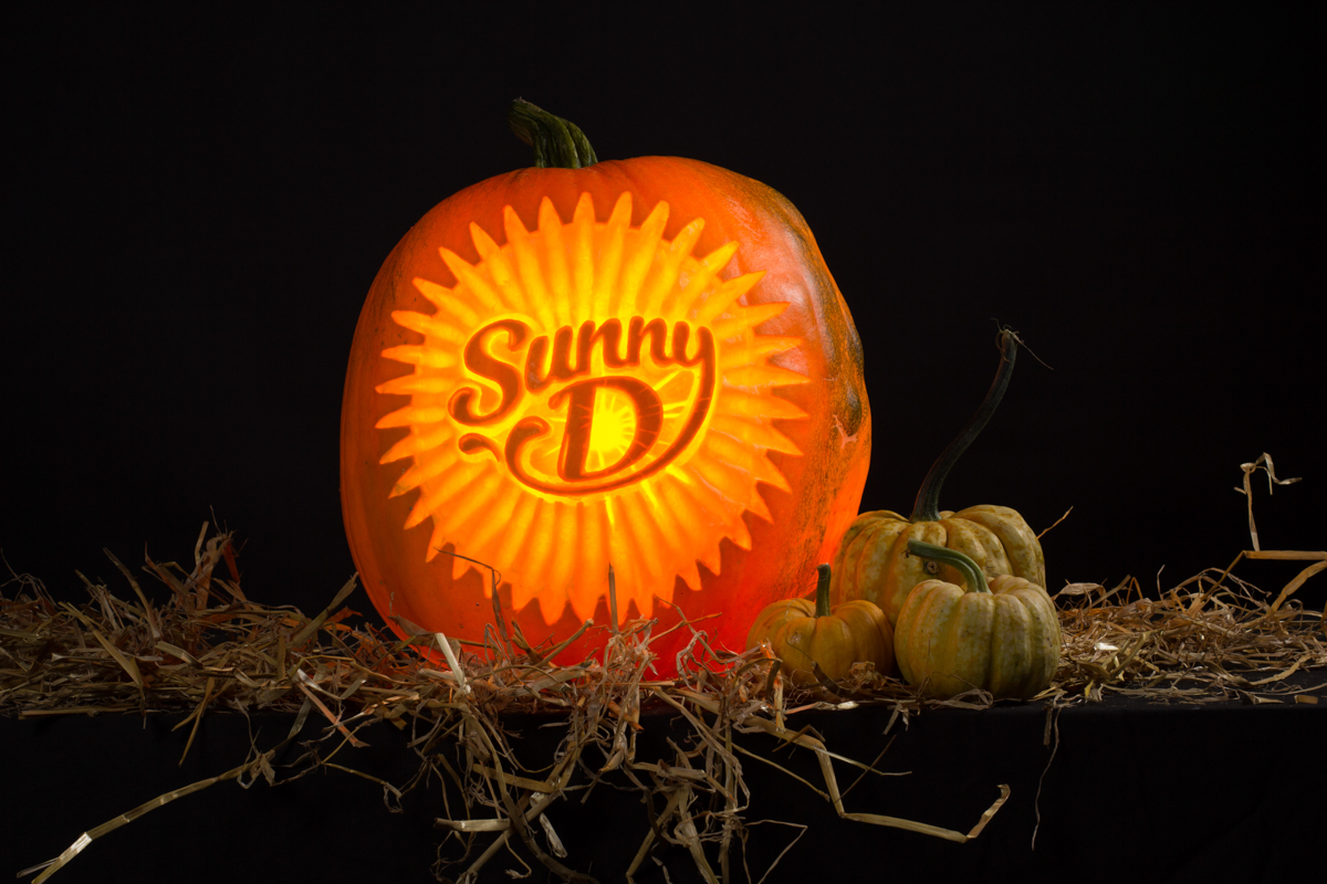 The precise art of carving logos into pumpkins