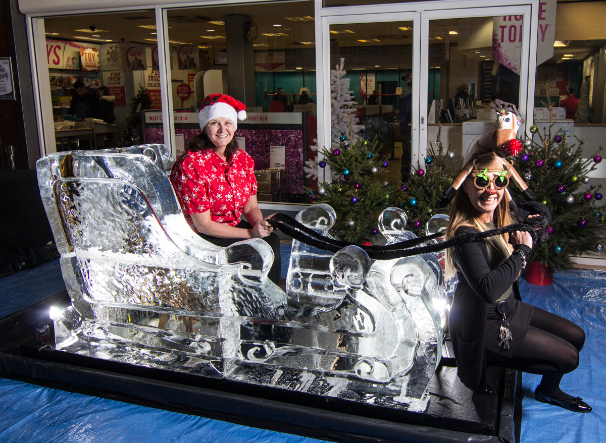 Santa poses for selfies with his Magical Ice Sculpture Sleigh at Idlewells Shopping centre