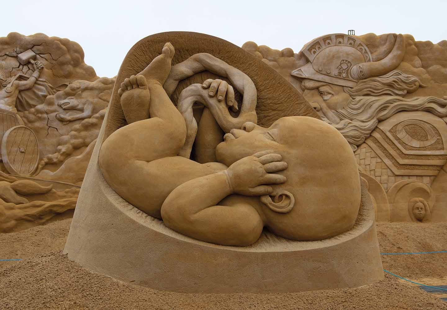 we_are_human_sand_sculpture