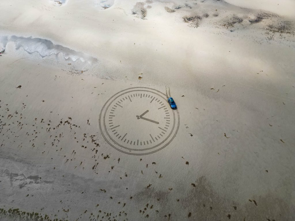 Sand drawing Electric car