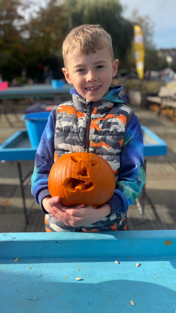 pumpkin carving child