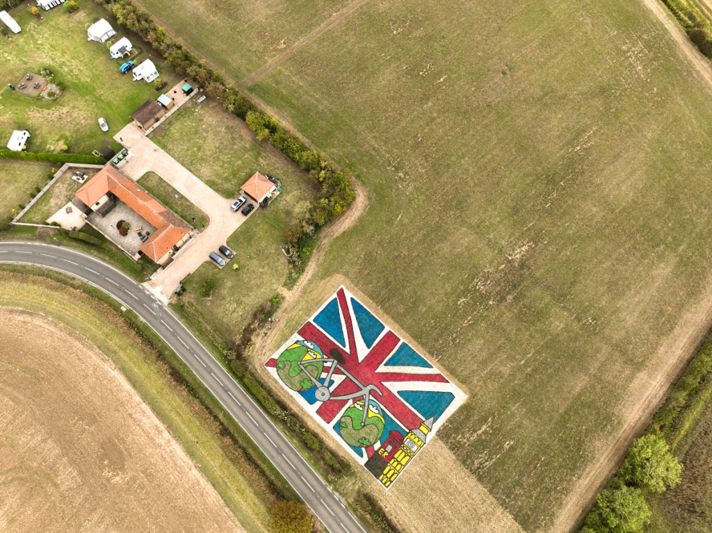 Children’s artwork brought to life into grass art for the Tour of Britain. 8 artwork_cycle_race