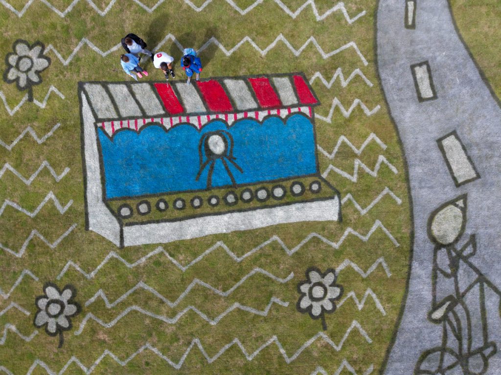 Children’s artwork brought to life into grass art for the Tour of Britain. 31 community_events