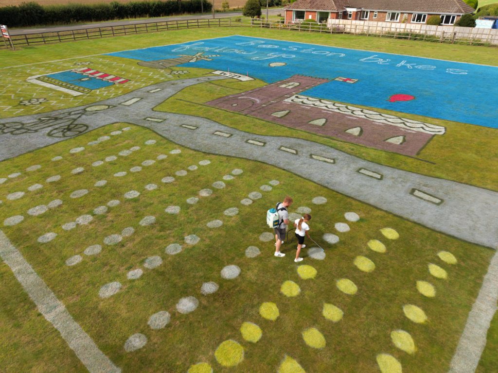 Children’s artwork brought to life into grass art for the Tour of Britain. 28 competition_winners_land_art