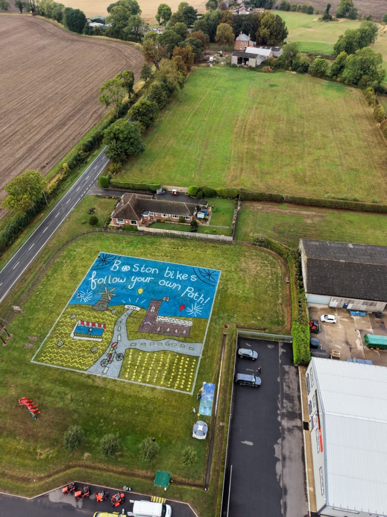 Children’s artwork brought to life into grass art for the Tour of Britain. 22 grass_painting