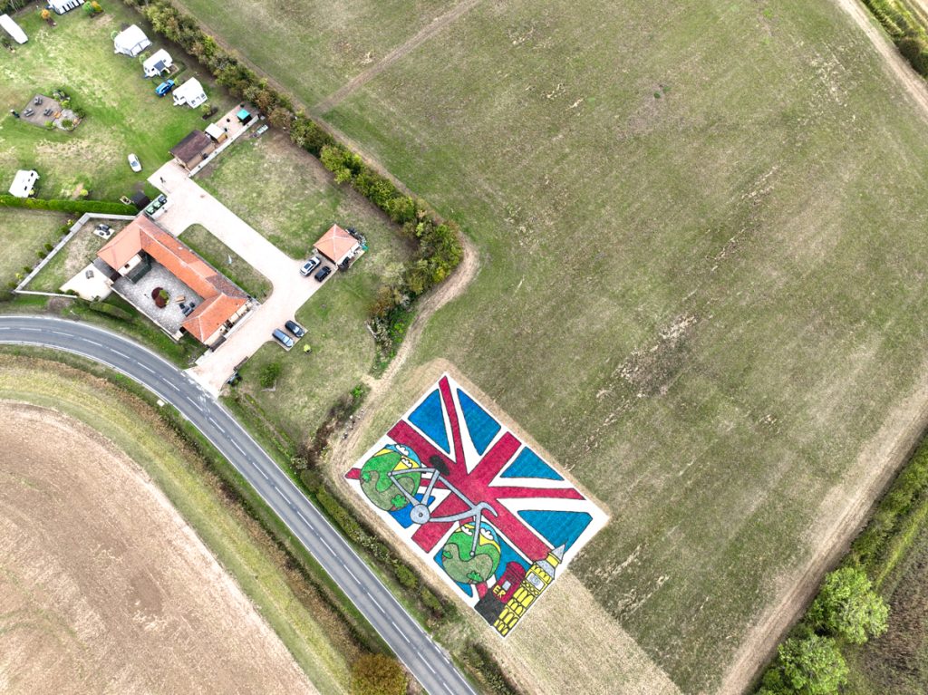 Children’s artwork brought to life into grass art for the Tour of Britain. 6 grass_painting_uk