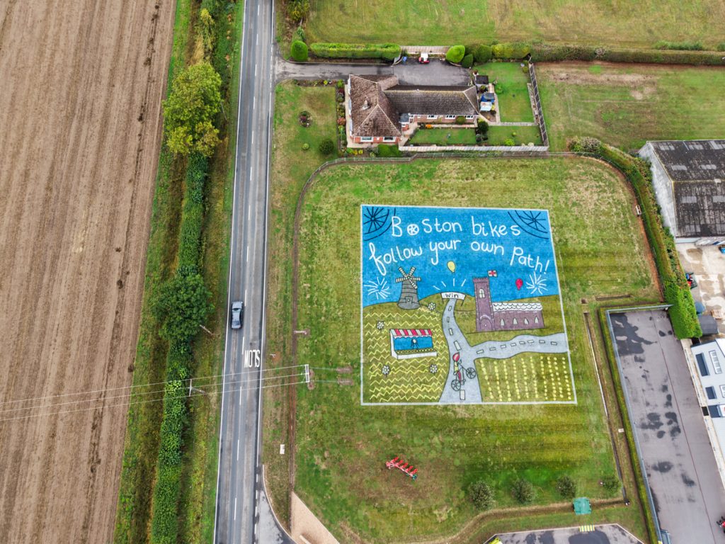 Children’s artwork brought to life into grass art for the Tour of Britain. 11 land_art