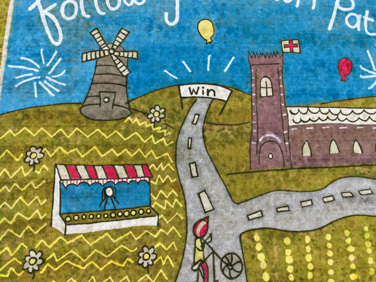 Children’s artwork brought to life into grass art for the Tour of Britain.