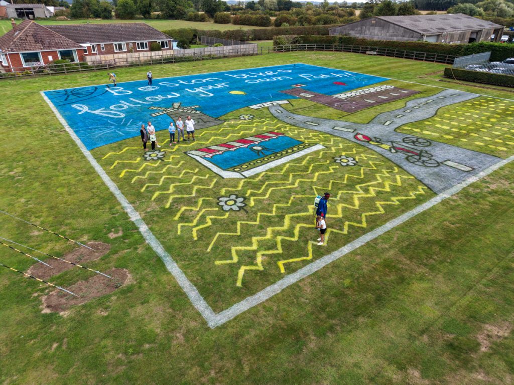Children’s artwork brought to life into grass art for the Tour of Britain. 5 land_art_workshops
