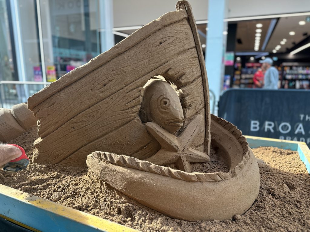 Sand, Sunshine, and High Street Buzz: Bradford by the Sea sand sculpture trail 5 live_carve_sand_sculpture