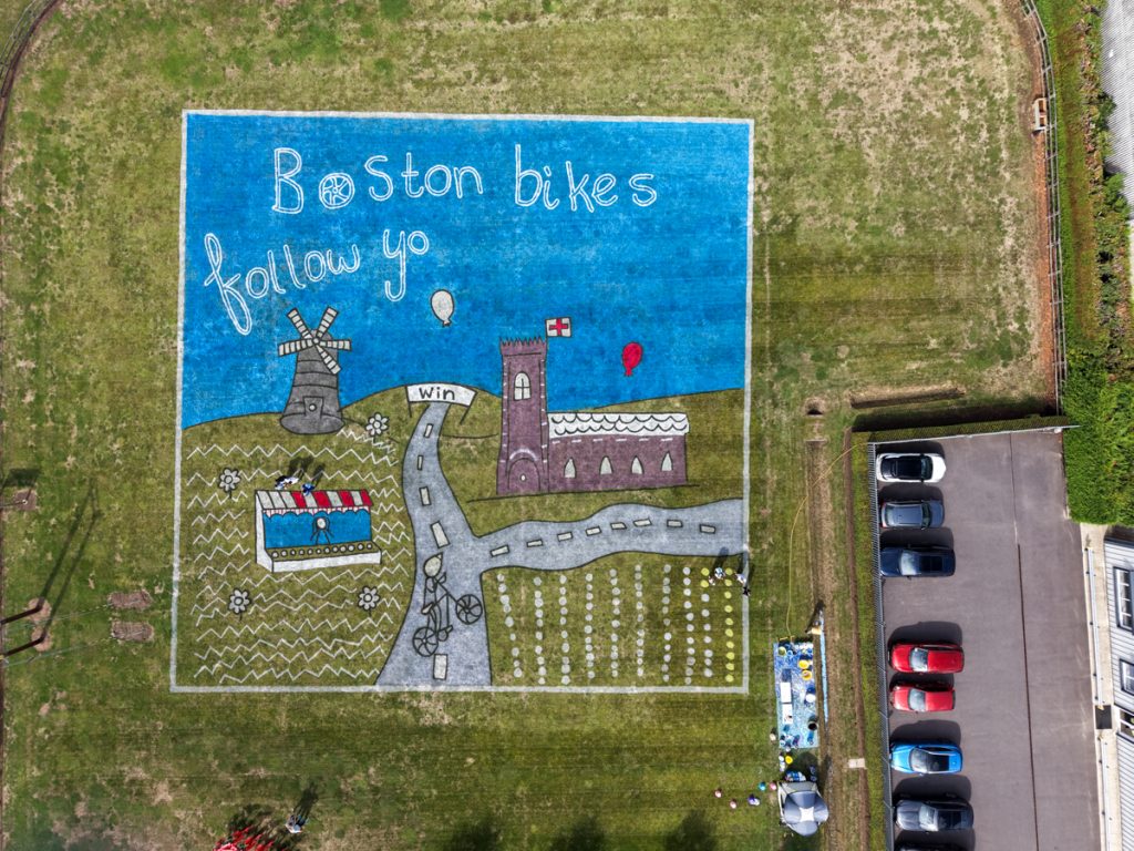 Children’s artwork brought to life into grass art for the Tour of Britain. 32 making_of_land_art