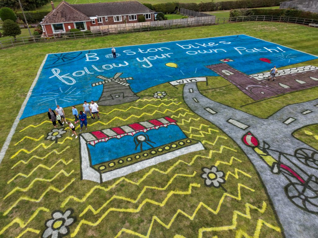 Children’s artwork brought to life into grass art for the Tour of Britain. 29 recreating_kids_artwork_huge_scale