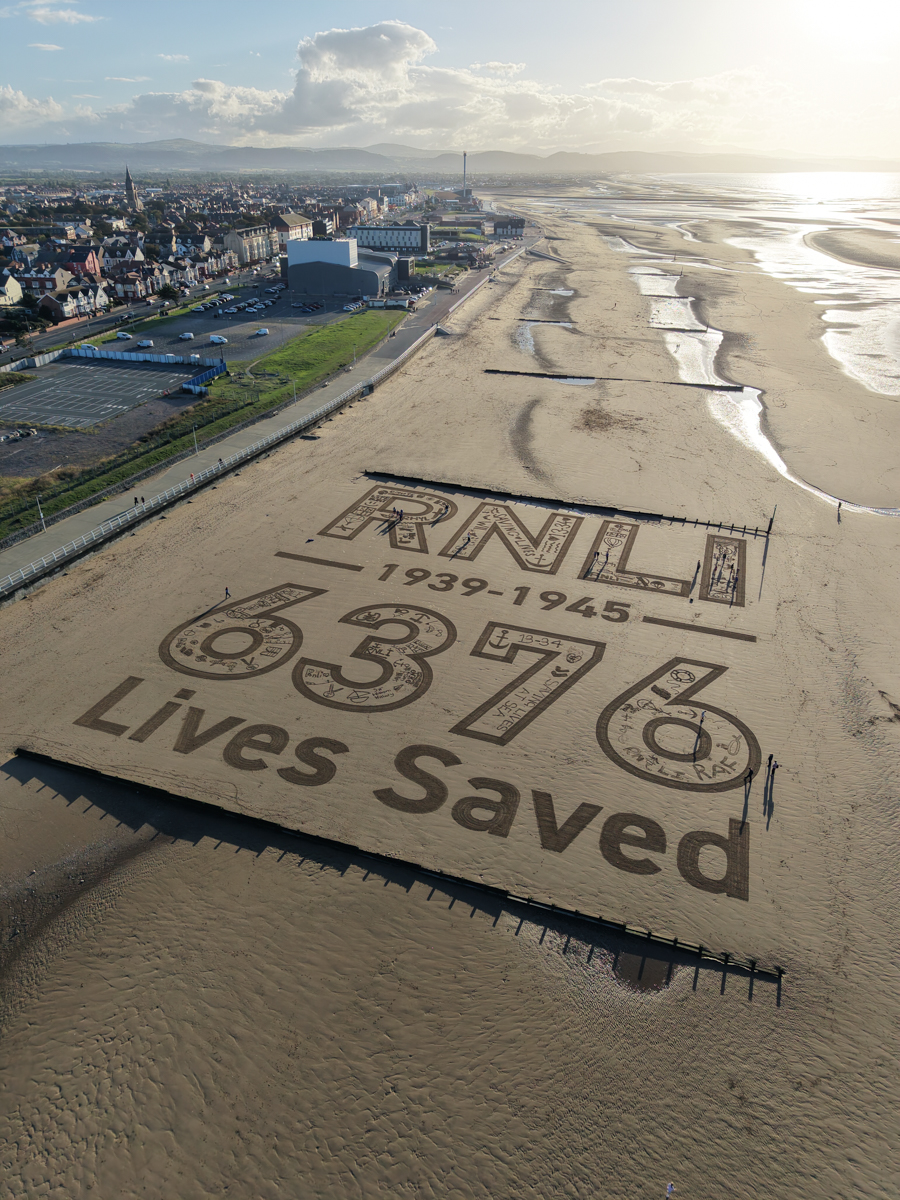RNLI large scale sand artwork in Rhyl